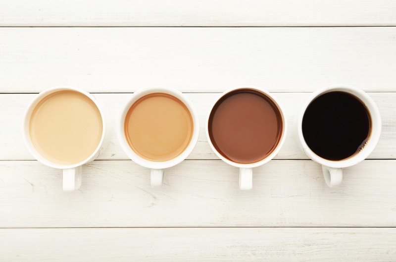 four cups of coffee which contain different levels of milk. low calorie drinks