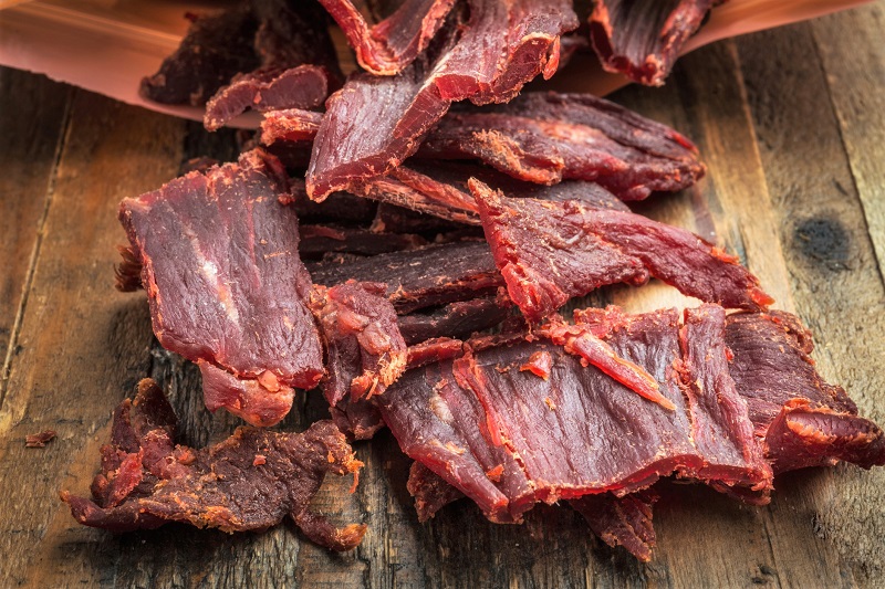 beef jerky on a wooden table
