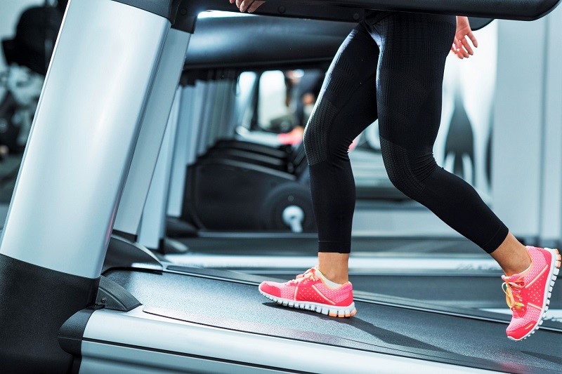 Woman Incline Treadmill Running